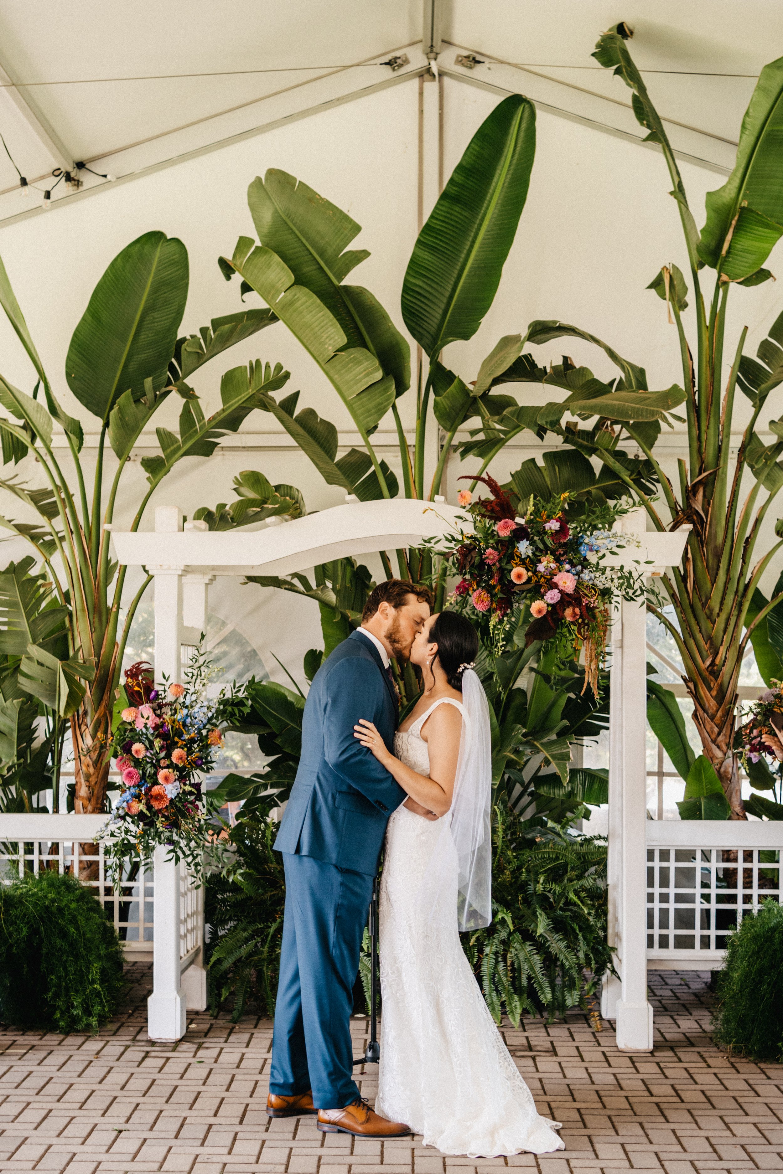 bride and groom kiss