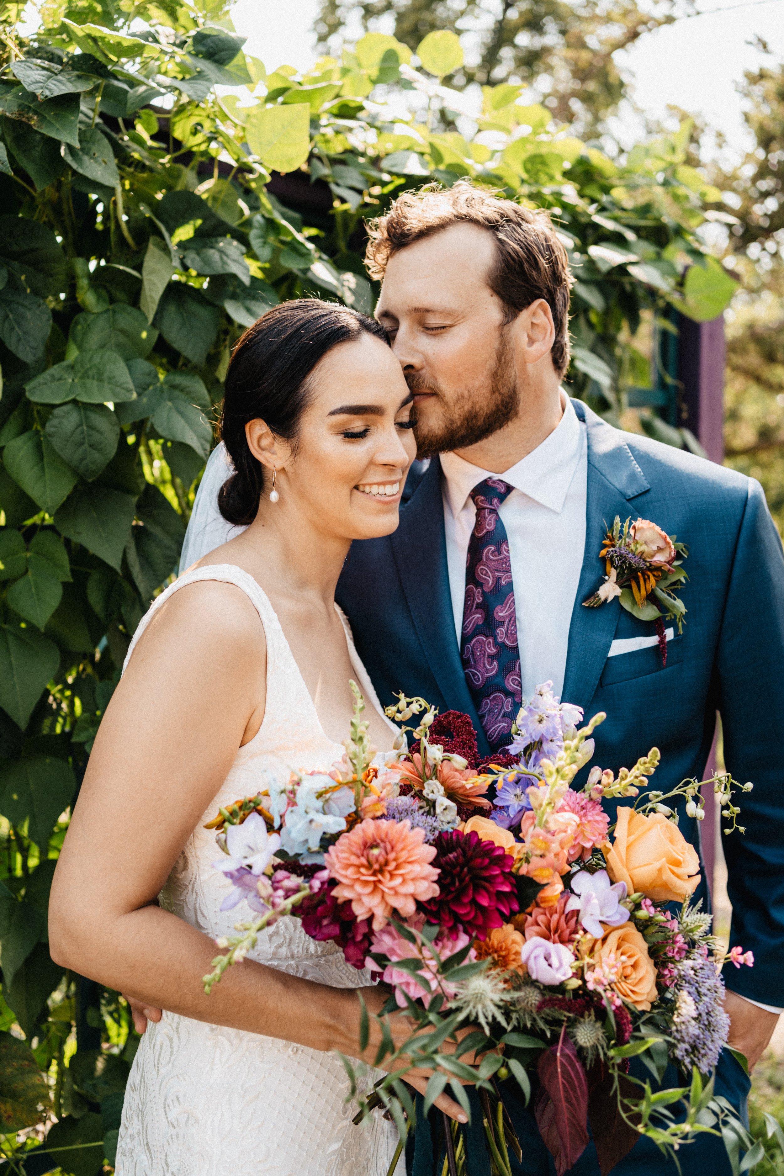 the bride and groom in a tender moment