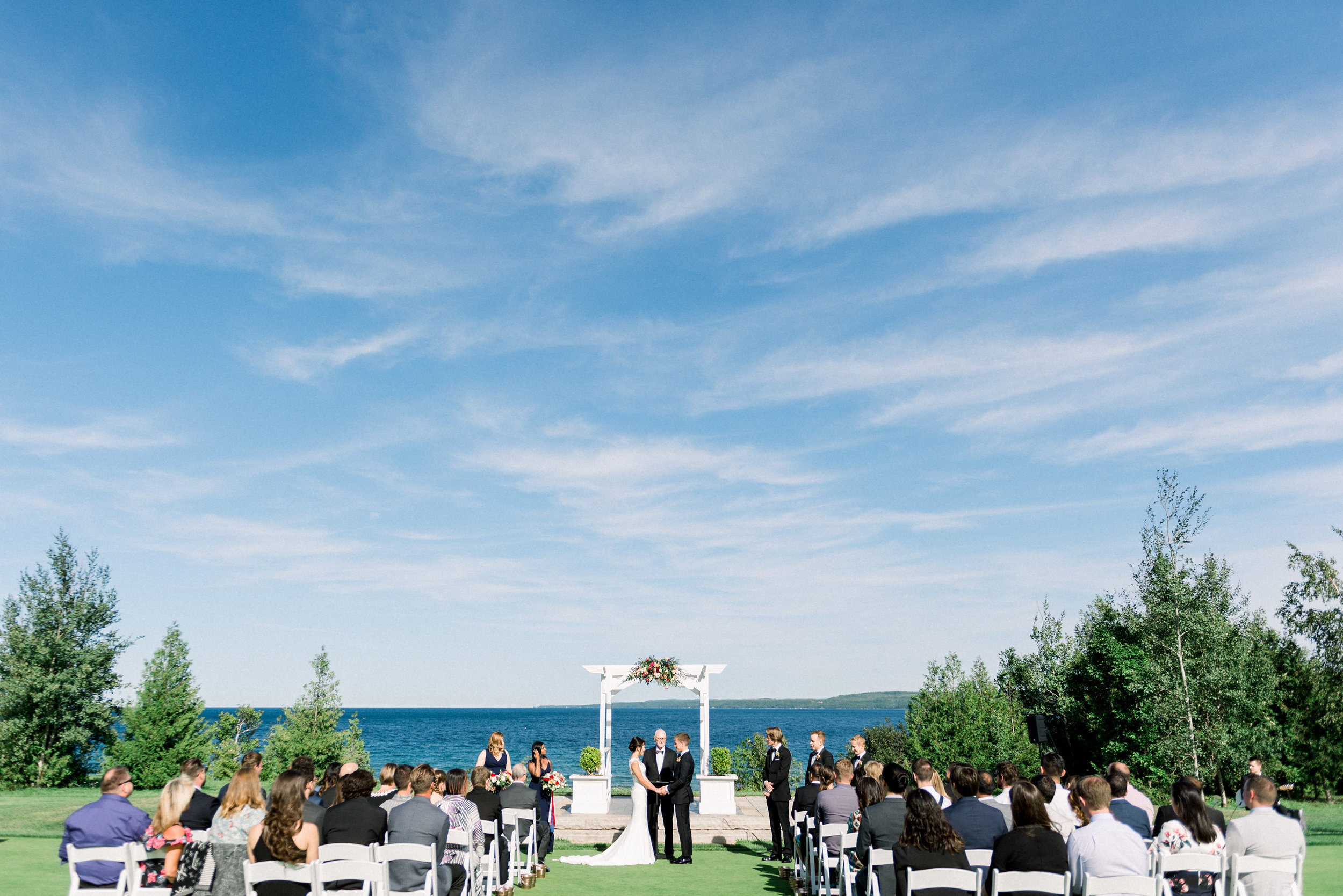 Picture perfect ceremony. Photo of Mamiko and Aaron by Whitney Heard. 2018. Flowers by Tina from Living Fresh.