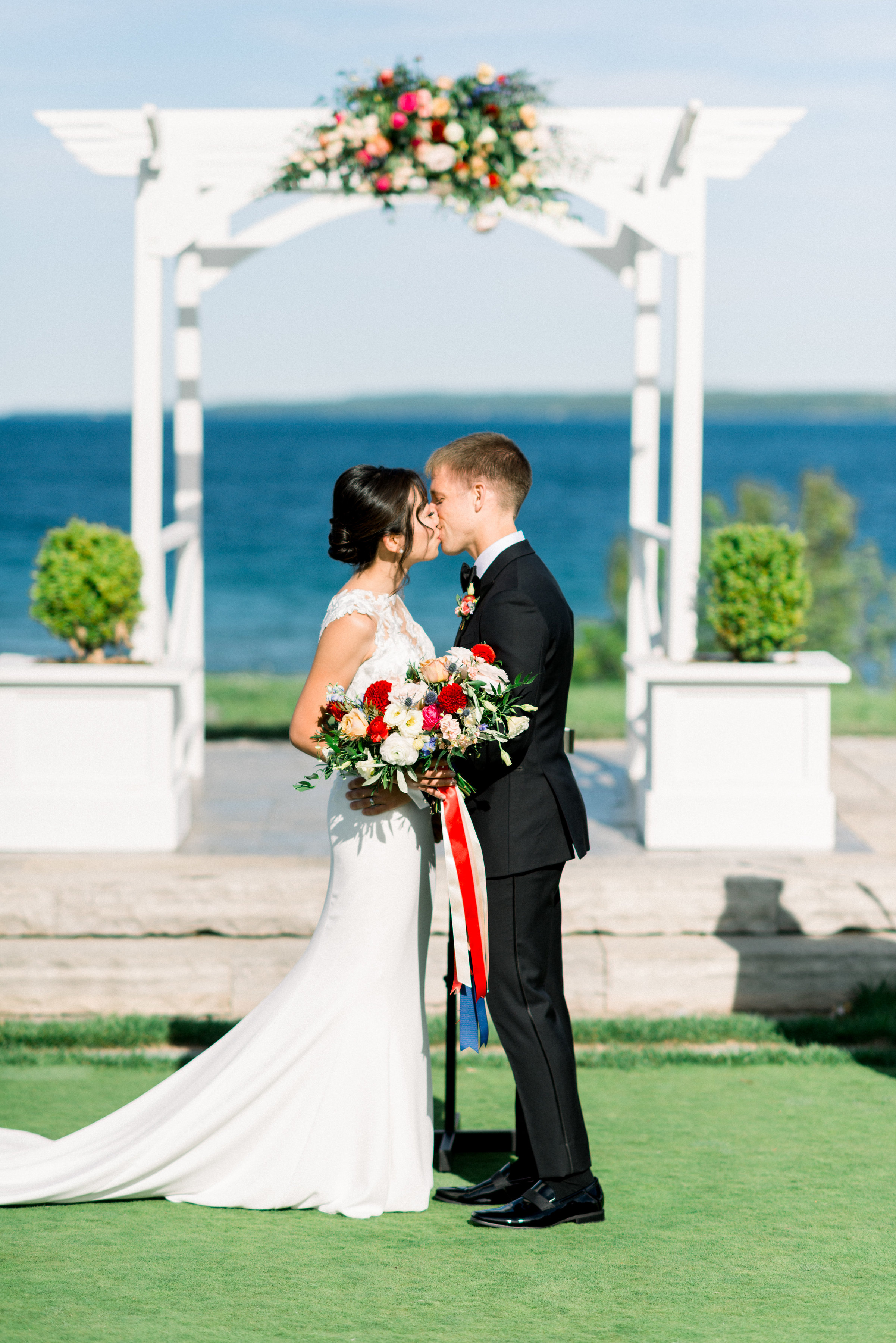 Photo courtesy of Whitney Heard 2018. Bride and bridal party’s makeup by Maya Goldenberg, all hair by Shanna Layton for Maya Goldenberg, Eco-Beauty Professional. Flowers by Tina from Living Fresh.