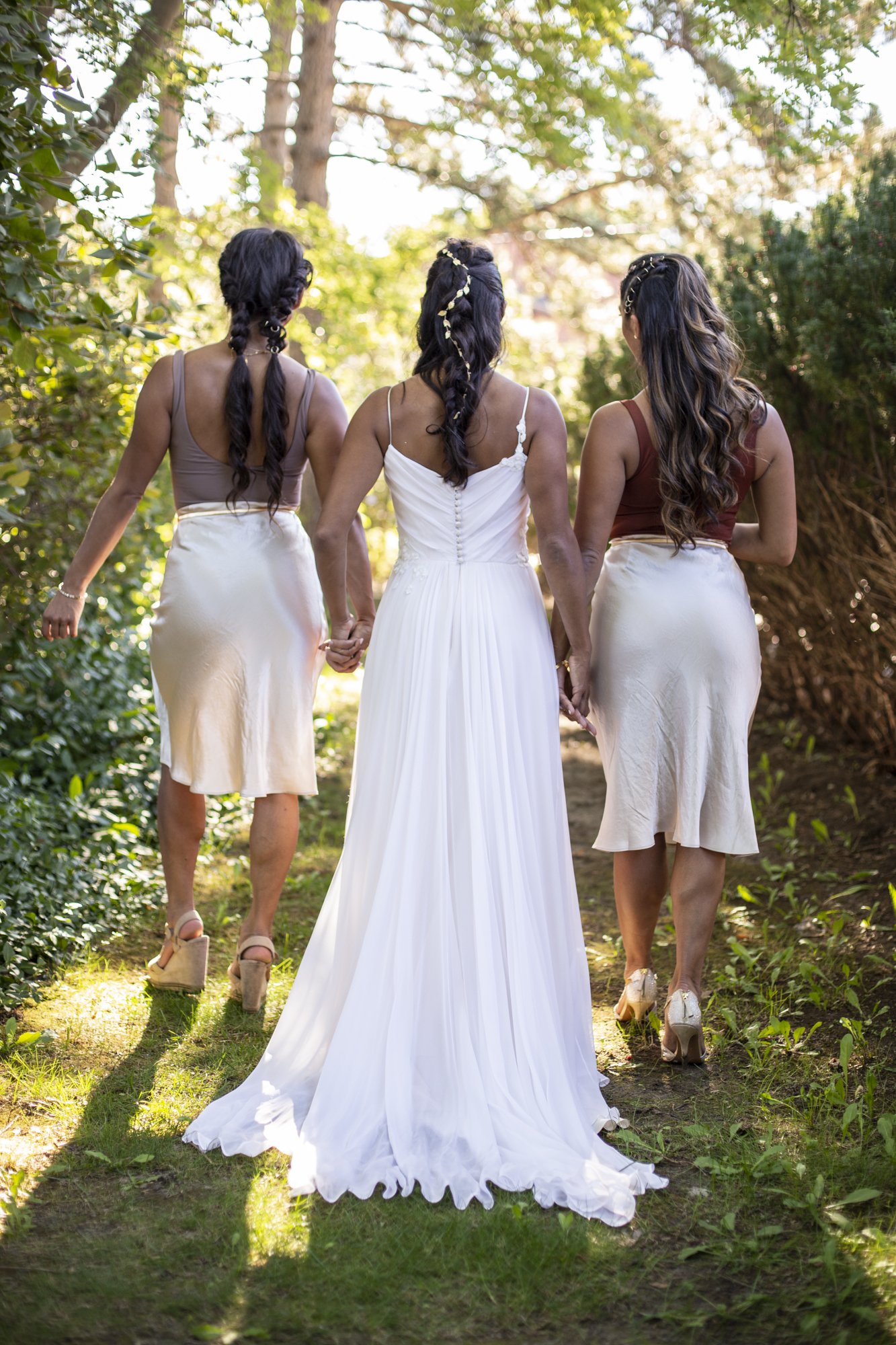 the three sisters- a backview of their hairstyles.