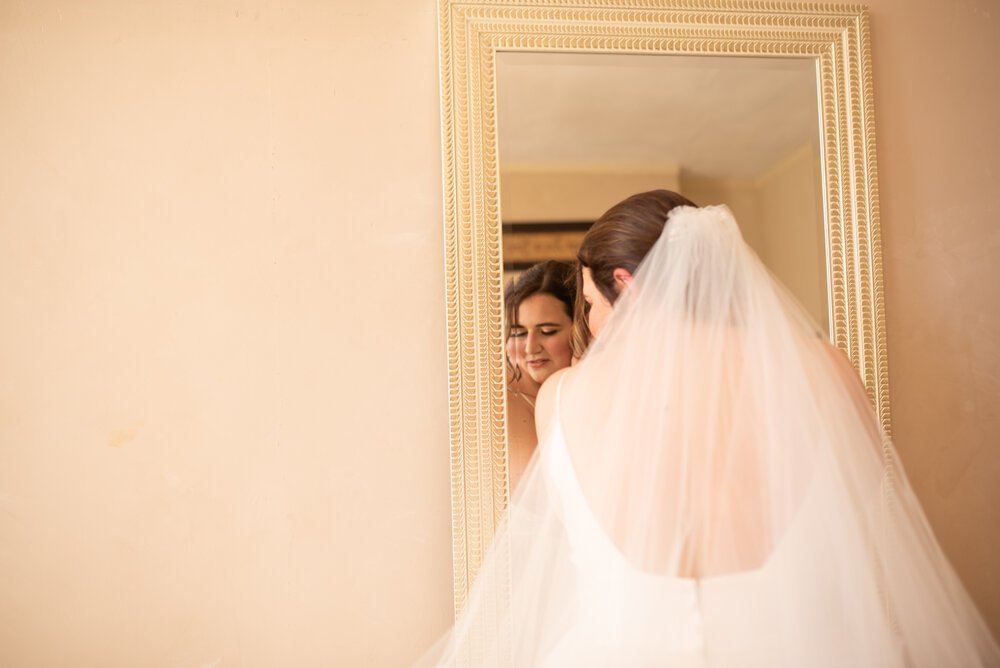 A quiet moment with the bride before the ceremony. Makeup by Maya Goldenberg Eco Beauty Professional.